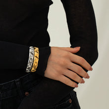 Load image into Gallery viewer, Elevate your style with this minimalist open bracelet, featuring sleek triangular notches for a modern touch. Crafted from premium stainless steel, it’s waterproof, tarnish-free, and perfect for everyday wear. Designed for both men and women, this low-key luxury piece makes a timeless and thoughtful gift!