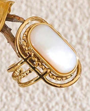 Load image into Gallery viewer, Elevate your style with this stainless steel natural shell geometric open ring, featuring a sleek and modern design with a luminous natural shell accent. Adjustable for the perfect fit, this 18K plated ring offers durability, shine, and a touch of elegance. A trendy yet timeless piece, it’s the perfect accessory for any occasion or a thoughtful gift for someone special.