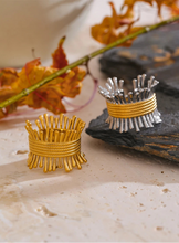 Load image into Gallery viewer, Elevate your style with this unique geometric open ring, featuring a sleek line of sticks elegantly hooped with a golden ring. Crafted from high-quality stainless steel and 18K PVD plated, it offers a luxurious shine and lasting durability. Available in both silver and gold variants, this statement piece adds a modern, chic touch to any outfit, making it a must-have for fashion-forward jewelry lovers.