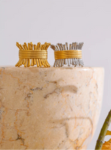 Load image into Gallery viewer, Elevate your style with this unique geometric open ring, featuring a sleek line of sticks elegantly hooped with a golden ring. Crafted from high-quality stainless steel and 18K PVD plated, it offers a luxurious shine and lasting durability. Available in both silver and gold variants, this statement piece adds a modern, chic touch to any outfit, making it a must-have for fashion-forward jewelry lovers.