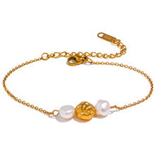 Load image into Gallery viewer, Elevate your style with this natural pearl and stainless steel beaded bracelet, a perfect blend of vintage charm and modern elegance. Featuring luminous natural pearls and gold-colored stainless steel beads, this piece adds a sophisticated touch to any outfit. Durable and timeless, it’s a versatile accessory that can be worn alone or stacked, making it a perfect gift for any stylish woman.