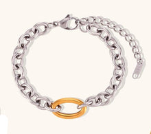 Load image into Gallery viewer, Make a bold statement with this cool 8mm thick stitching O-chain necklace, featuring a stunning silver color with a contrasting gold paperclip buckle for a modern edge. Crafted from premium stainless steel, this durable and sleek piece adds a touch of sophistication to any outfit. Perfect for layering or wearing solo, it's a versatile accessory for both casual and dressy occasions. A must-have addition to any jewelry collection!
